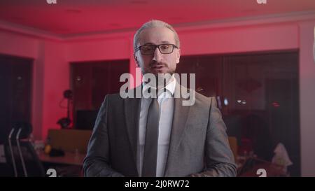 Business man manager in suit looking at camera or webcam talking having remote virtual meeting, video conference call leading corporate training worki Stock Photo