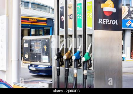 Huelva, Spain - March 6, 2022: Petrol pump at a Repsol gas station. Service and vehicle refueling station of the multinational company Repsol Stock Photo