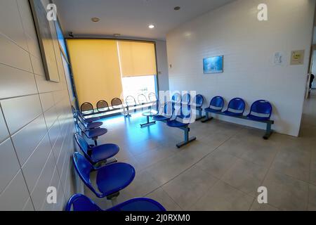 Huelva, Spain - March 9, 2022: Empty waiting room inside of almost empty health center due to coronavirus Covid-19 Stock Photo