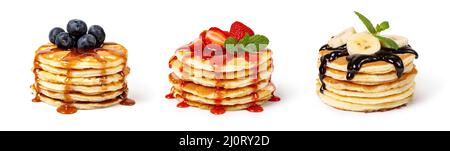 Pancakes with fruit and syrup Stock Photo