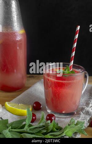 Watermelon juice with lemon and cherry berries Stock Photo