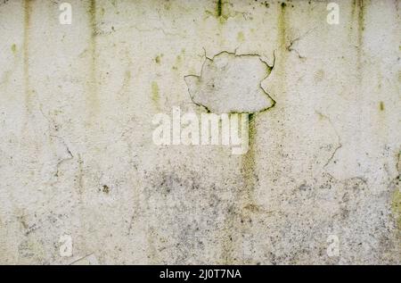 Wall facade as natural background, discolored dirty plaster Stock Photo