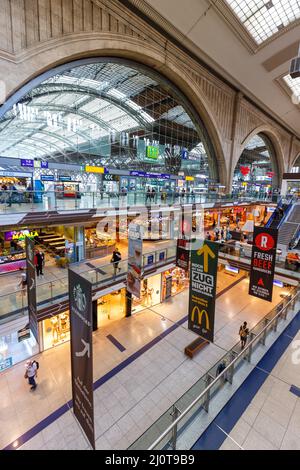 Leipzig central station Hbf in Germany Deutsche Bahn DB Halle with stores stores portrait format Stock Photo