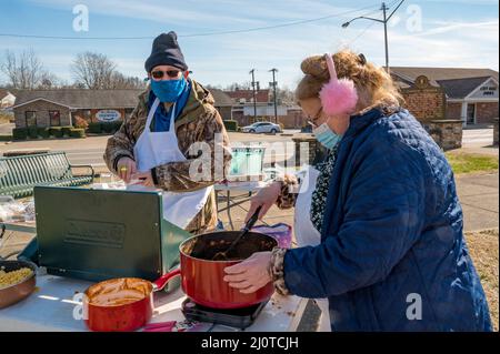 Dawson Springs, , KY, January 22, 2022 -- Volunteers Danielle Day and Terry McCrarey cook food to serve tornado survivors. The tornado devastated the town in early December. Photo by Liz Roll/FEMA Stock Photo