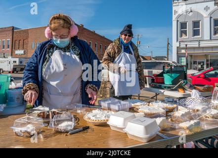 Dawson Springs, , KY, January 22, 2022 -- Volunteers Danielle Day and Terry McCrarey serve food to tornado survivors. The tornado devastated the town in early December. Photo by Liz Roll/FEMA Stock Photo