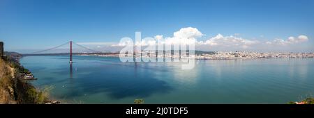 Lisbon Portugal bridge Ponte 25 de Abril over river Tejo panorama travel travel city Stock Photo