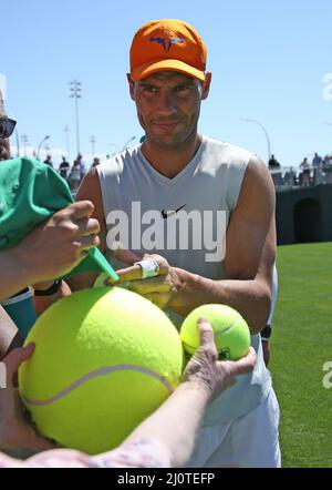 Indian Wells, United States. 20th Mar, 2022. Rafael Nadal of Spain signs autographs for fans before his men's final match against American Taylor Fritz at the BNP Paribas Open in Indian Wells, California on Sunday, March 20, 2022. Photo by David Silpa/UPI Credit: UPI/Alamy Live News Stock Photo