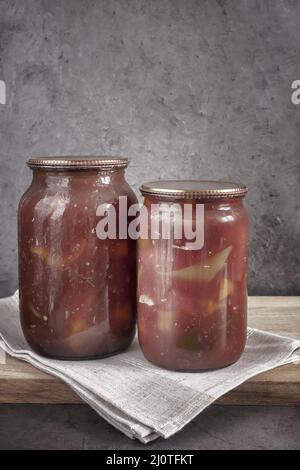 Home canning: canned bell peppers in glass jars Stock Photo