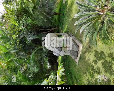 Vertical shot of a beautiful sculpture of a deer at the Bande Park (Stone Park) in Begur Stock Photo