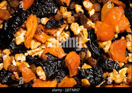 Close-up of a mixture of various dried fruits and nuts. Healthy food and snack Stock Photo