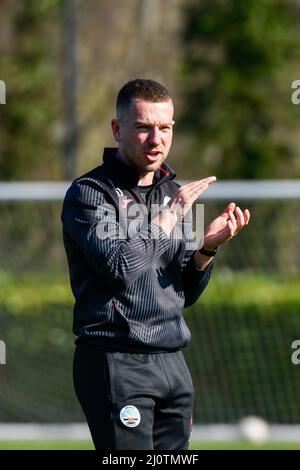 Swansea, Wales. 19 March, 2022. Swansea City Coach Olilver Jeffries during the pre-match warm-up before the Professional Development League game between Swansea City Under 18s and Colchester United Under 18s at the Swansea City Academy in Swansea, Wales, UK on 19, March 2022. Credit: Duncan Thomas/Majestic Media. Stock Photo