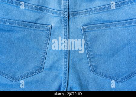Close-up view of blue jeans - back view pockets Stock Photo