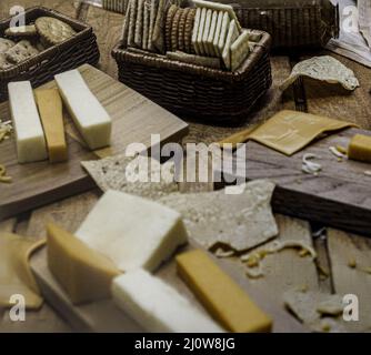 Cheese and crackers spread on table. Stock Photo