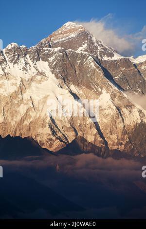 Evening view of Mount Everest with beautiful clouds from Kongde village, Khumbu valley, Solukhumbu, Nepal Himalayas mountains Stock Photo