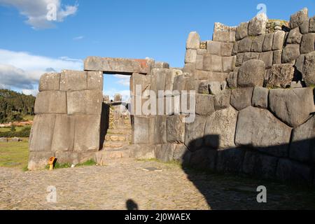 Stone door. View of Sacsayhuaman, Inca ruins in Cusco or Cuzco town, Peru Stock Photo