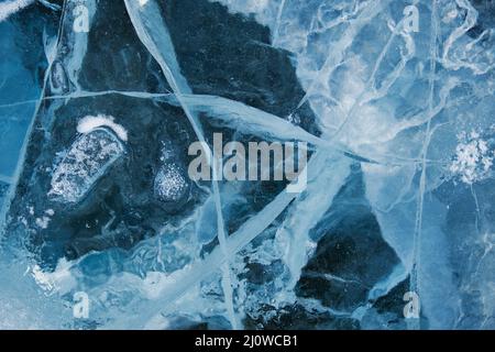 Texture of winter ice surface. Blue natural ice background Stock Photo