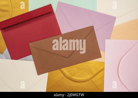 Heap of colorful envelopes on the desk Stock Photo