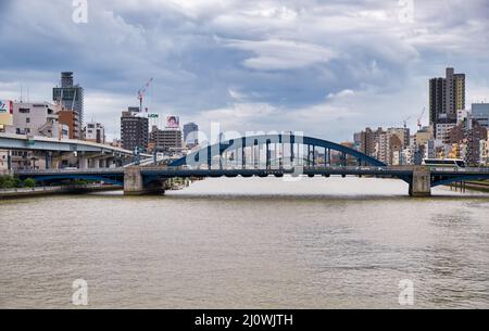 Blue arch Komagata bridge over Sumida River.Tokyo. Japan Stock Photo