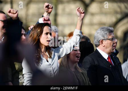 Paris, France. 20th Mar, 2022. Clemence Guette, the program co-leader for the left-wing candidate Jean-Luc Melenchon (La France Insoumise, LFI), during a major meeting after a march for 6th (VIth) Republic from the Bastille to the Place de la Republique three weeks before the first round of the French presidential election, in Paris, France, on March 20, 2022. Credit: Victor Joly/Alamy Live News Stock Photo