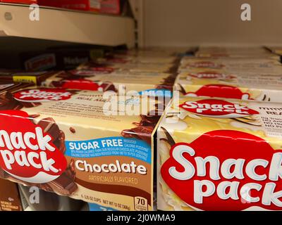 Grovetown, Ga USA - 03 19 22: Retail store shelf Retail store shelf snack packs top view pudding cups Stock Photo