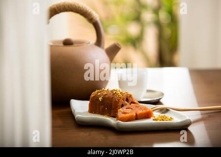 Chinese cuisine,Steamed lotus root stuffed with sweet sticky rice Stock Photo