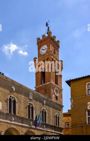 PIENZA, TUSCANY, ITALY - MAY 18 : Communal Palace clock tower in Pienza, Tuscany, Italy on May 18, 2013 Stock Photo