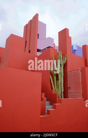 Calpe. 18th Mar, 2022. Photo taken on March 18, 2022, shows a view of the famous building La Muralla Roja in Calpe, Spain. Credit: Meng Dingbo/Xinhua/Alamy Live News Stock Photo