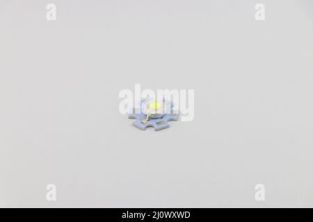 High power LED 1W or 3Watts or 5W placed on its heatsink on white background, LED technology with less power consumption and more light Stock Photo