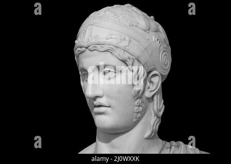 A statue of the ancient Greek god of war. Ares is the son of Zeus and Hera. One of the twelve gods of Olympus isolated on black Stock Photo