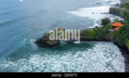 Beautiful drone view of famous Batu Bolong and Tanah Lot Temple, West Bali Stock Photo