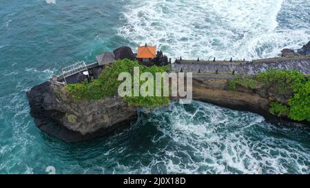 Beautiful drone view of famous Batu Bolong and Tanah Lot Temple, West Bali Stock Photo