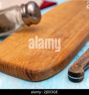 Wooden oak cutting board. Kitchenware. Copy space. Stock Photo