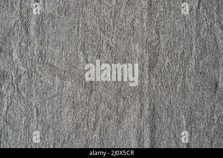 Natural linen texture background. Crumpled fabric of gray color, rough texture Stock Photo