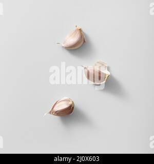 Top view three garlic cloves. High quality beautiful photo concept Stock Photo