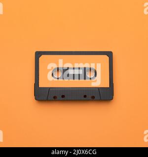 Vintage cassette tape orange background. High quality beautiful photo concept Stock Photo