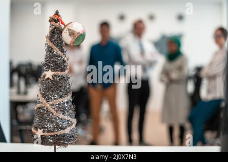 Portrait of young excited multiethnics business team of software developers standing and looking at camera at modern startup off Stock Photo