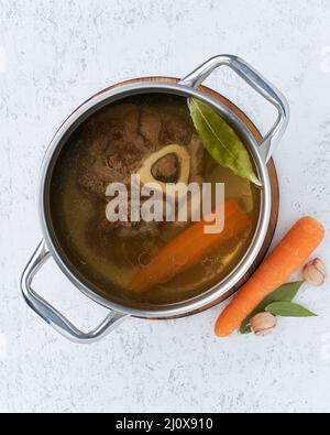 Paleo bone broth diet, beef meat soup. Low-carb food, keto recipe. Stock Photo