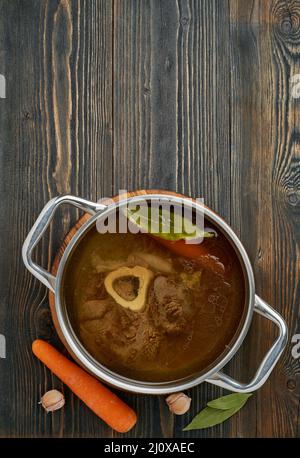 Paleo bone broth diet, beef meat soup. Low-carb food, keto recipe. Stock Photo