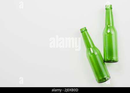 Green empty bottles white background Stock Photo