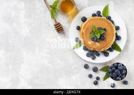 Top view sweet pancakes composition with copy space. High quality beautiful photo concept Stock Photo
