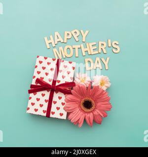 Happy mother s day lettering gift box flowers close up. High quality beautiful photo concept Stock Photo