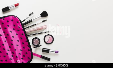 Pink makeup case with cosmetics brushes. High quality beautiful photo concept Stock Photo
