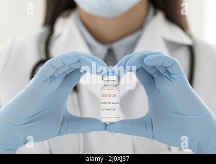 Doctor holding vaccine recipient. High quality beautiful photo concept Stock Photo