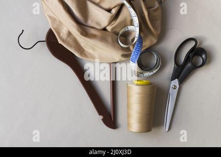 Dressmaker workspace with tools hanger. High quality beautiful photo concept Stock Photo