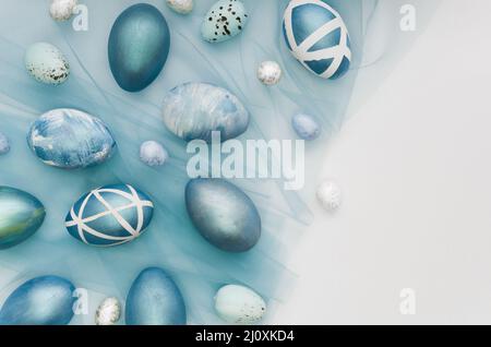Flat lay painted easter eggs with copy space Stock Photo