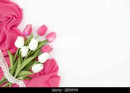 Flat lay pink white tulips. High quality beautiful photo concept Stock Photo