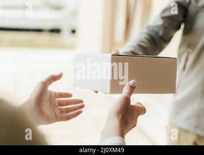 Close up hands getting box. High quality beautiful photo concept Stock Photo