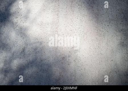 Relief exterior wall with irregular shadow on it Stock Photo