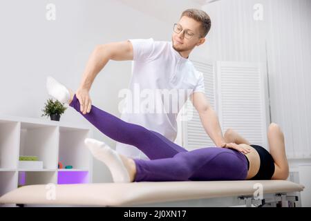 Sports massage for muscle relaxing, massage after workout Stock Photo -  Alamy