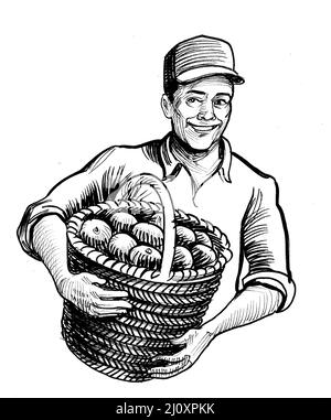 Happy farmer with a basket of apples. Ink black and white drawing Stock Photo